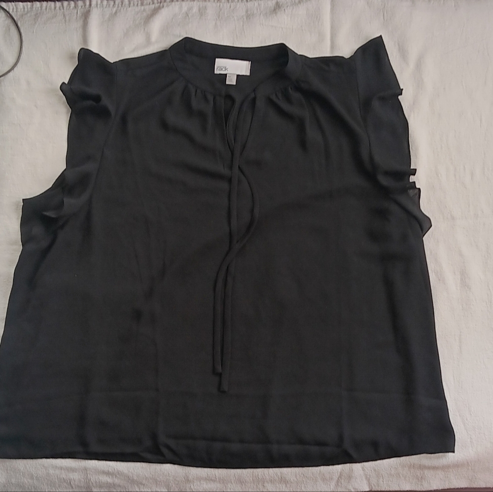 Black Sleeveless Top with ruffle shoulder.